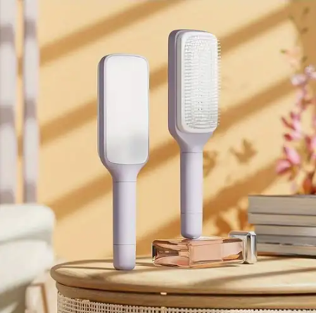 Self cleaning hair brush™